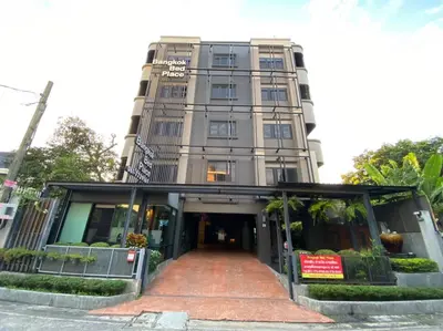 a tall building with a walkway in front of it at bangkok bed place in Bangkok