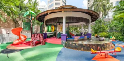a childrens playground with a water park at Conrad Bangkok Residences in Bangkok