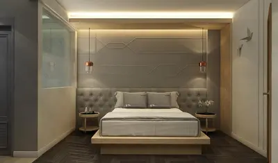 a bedroom with a bed and two tables in it at Tori Prestige Bangkok Hotel in Bangkok