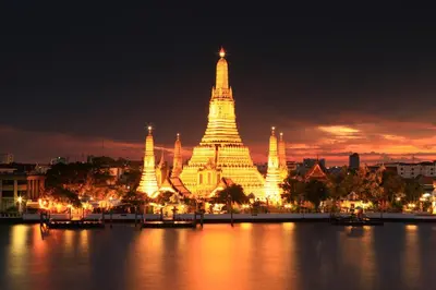 a view of a large building at night at 24Residence Siriraj in Bangkok