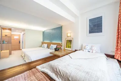 a hotel room with two beds and a room with at P2 Boutique in Bangkok