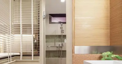 a bathroom with a glass shower with a sink at Tango Vibrant Living Hotel - SHA Extra Plus in Bangkok