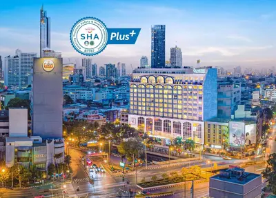 a view of a city at night with buildings at The Quarter Hualamphong by UHG in Bangkok