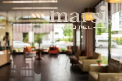 a blurry picture of a store with the words marsfield at Marsi Hotel Bangkok in Bangkok