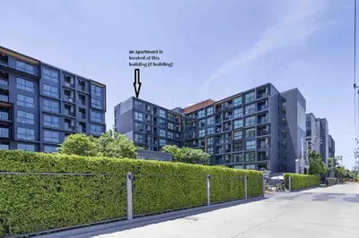a row of tall buildings in a city at The Excel Groove Condo at Lasalle 52 in Bangkok