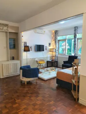 a large living room with a bed and a couch at Villa Thaï Sukhumvit Asok Nana in Bangkok