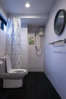 a bathroom with a toilet and a shower at T2 2 Bedrooms 6 guests Full kitchen 1 min to BTS in Bangkok
