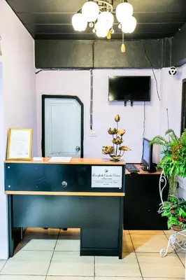 an office with a desk with a computer on it at Bangkok Canale Home at Khaosarn in Bangkok