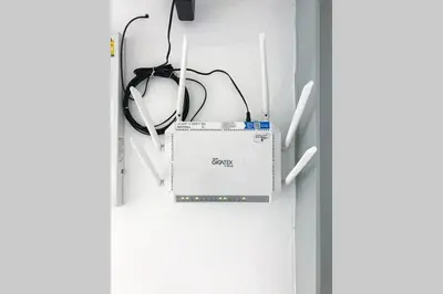 a computer sitting on top of a door at P2 Silom Large 2beds full kitchen WIFI 4-6pax in Bangkok