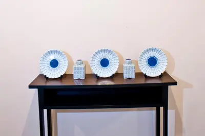 a table with blue and white plates on it at G9bangkok in Bangkok