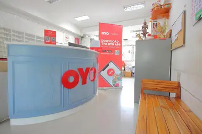 a store with a tv in the middle of a room at Super OYO 498 Ladawan Villa in Bangkok
