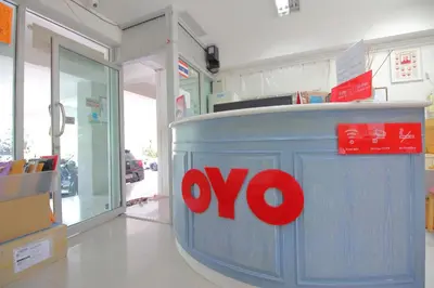 a blue container with a yes sign on it in a store at Super OYO 498 Ladawan Villa in Bangkok