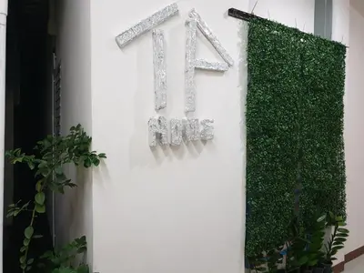 a sign for a house with the number fortyfive at TP home in Bangkok