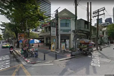 an intersection of a city street with a building at S3 Silom26 · S3 Silom central, large room, full kitchen, WIFI, in Bangkok