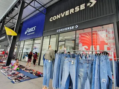 a store with jeans on display in front of a store at Popular CondoT8@IMPACT Arena in Nonthaburi