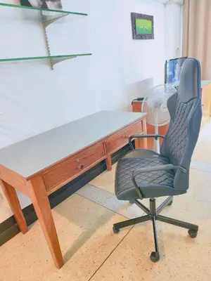 a desk with a chair and a glass table at Cloud no 3 Serene Oasis King Bed in BKK Heart in Bangkok