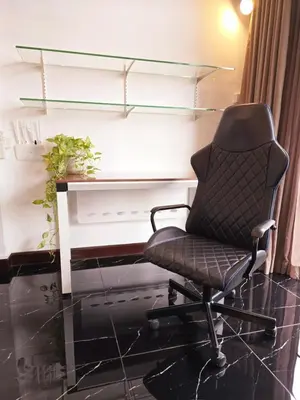 a black office chair sitting in front of a desk at Old Spice 4 Downtown Serenity Luxurious Oasis BKK in Bangkok