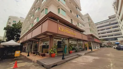 a store front of a building on a city street at City Plaza Nana Hotel in Bangkok