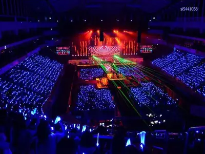 an aerial view of an arena at night with lights at DMK Don Mueang Airport Guest House in Bangkok