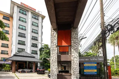 a building in front of a building at The Wing Design Hotel in Bangkok