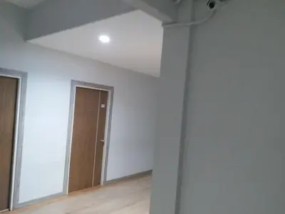 an empty room with a ceiling and a door at DD Garden Apartment 2 in Bangkok