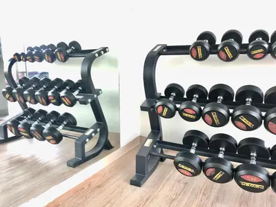a rack of dumbbells in a gym at LeeNova Place in Lat Krabang