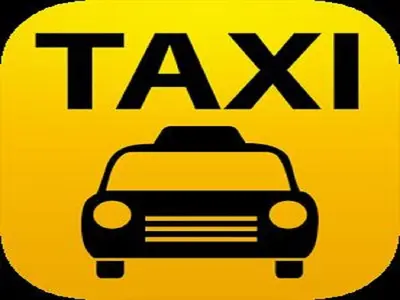 a yellow taxi sign with the word taxi at Near Impact Challenger Bangkok Thailand in Nonthaburi