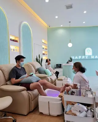 a group of people sitting on couches in a store at Mintel Huamark in Bangkok