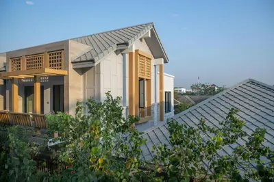 a house with a slate roof at SHAN Villas Sukhumvit ฌานวิลล่า สุขุมวิท in Bangkok
