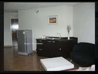 a living room with a couch and a refrigerator at Popular Palace in Don Mueang Bangkok in Ban Bang Phang