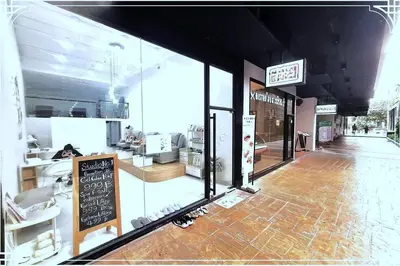 a store front with a sign on the front of it at Nice Residence in heart of Bangkok in Bangkok
