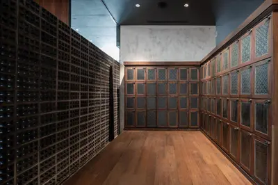 a wine cellar with a bunch of wine racks at Beanstalk Bangkok in Bangkok