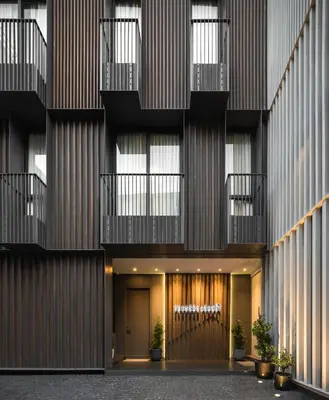 an external view of a building with balconies at humble abode Bangkok Vacation Home in Bangkok