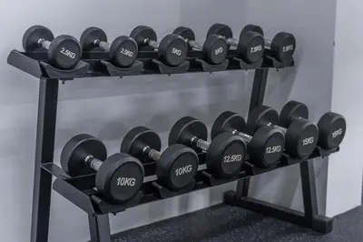 a rack of dumbbells in a gym at Sabai Residence @Bangyai in Nonthaburi