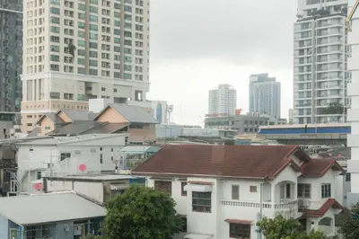 a group of buildings in a city with tall buildings at Lemon Siam Hostel Free Breakfast in Bangkok