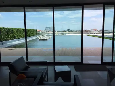 a living room with a view of the water at New condominium on Sukhumvit Road 