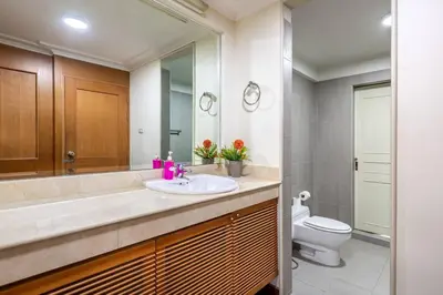 a bathroom with a sink and a toilet at AT NANA-5Bed, CITY CENTER, Nana BTS, MBK, Central World, Siam in Bangkok