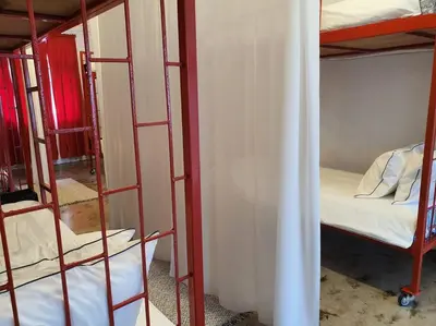 a group of bunk beds in a room at Great House for Families and Big Groups in Bangkok