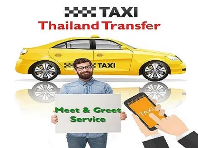 a man holding a sign in front of a yellow car at T8 Guest House Don Mueang Challenger in Ban Song Hong