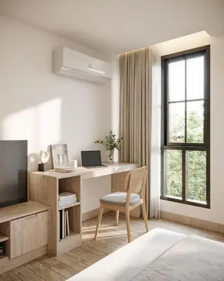 a white living room with a desk and a television at Leon Lasalle Hotel and Residences in Bangkok