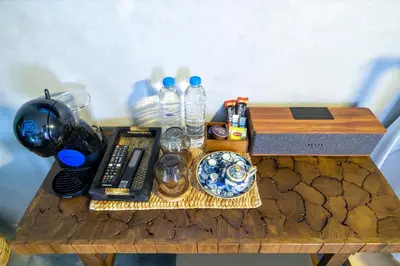 a table topped with a table with a helmet on it at Lo-Ha Guest house, Contactless Check-in in Bangkok