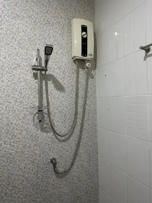a shower in a bathroom with a soap dispenser at S Villa @Impact Muangthongthani in Pak Kret