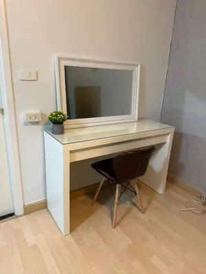 a desk with a television on top of it at S Villa @Impact Muangthongthani in Pak Kret