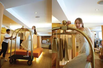 a woman in a wedding dress on a clothes rack at Arck Hotel in Bangkok