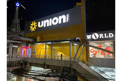 a building with a sign for the united nations at Grandview Place in Bangkok