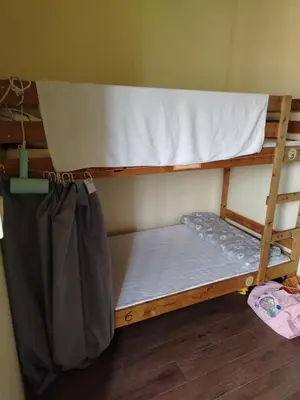 a couple of bunk beds in a room at \u66fc\u8c37\u8d75\u5c0f\u59d0\u7684\u5e97MissZhaoHostel in Bangkok