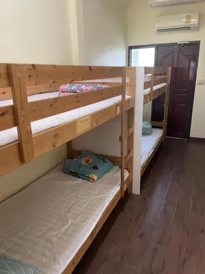 a couple of bunk beds in a room at \u66fc\u8c37\u8d75\u5c0f\u59d0\u7684\u5e97MissZhaoHostel in Bangkok
