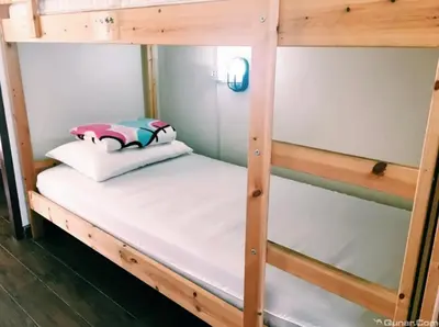 a couple of bunk beds in a room at \u66fc\u8c37\u8d75\u5c0f\u59d0\u7684\u5e97MissZhaoHostel in Bangkok