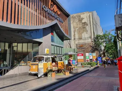 a food van parked in front of a building at I'M Chinatown Residence Yaowaraj Bangkok Watmungkorn MRT Station in Bangkok