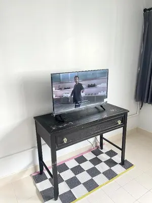 a tv sitting on top of a table at Lively Impact C3-C9 in Nonthaburi